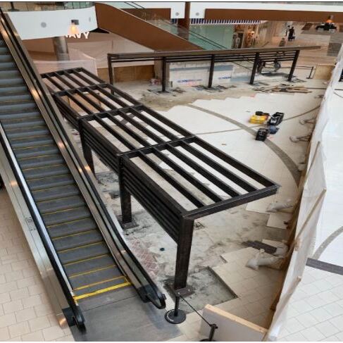 High-Traffic Architectural Steel: Custom feature canopy and structural trellis. Installed after-hours with strict clean-site protocols to ensure zero disruption to retail operations and public safety.
